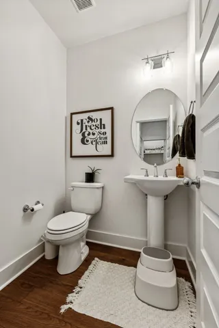 a view of a bedroom with washer and dryer