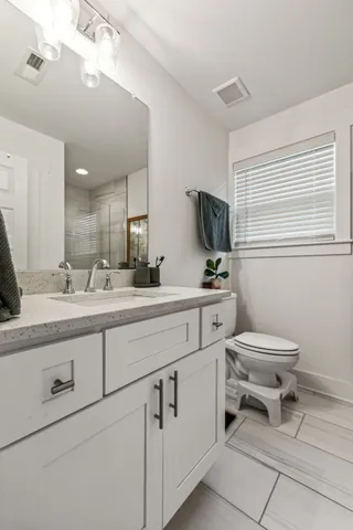 a bathroom with a shower and bathtub