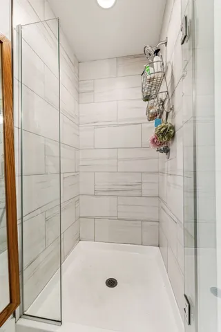 a view of a balcony with wooden floor