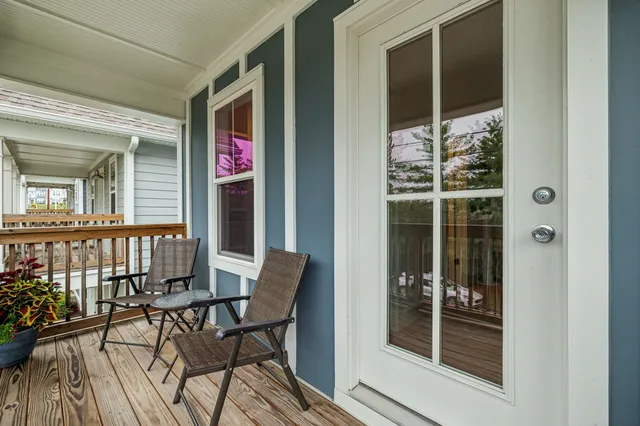 a view of a two chair in the balcony