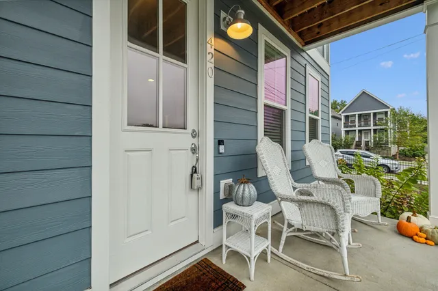 a balcony view with a outdoor seating space