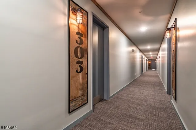 a view of parking garage with cars