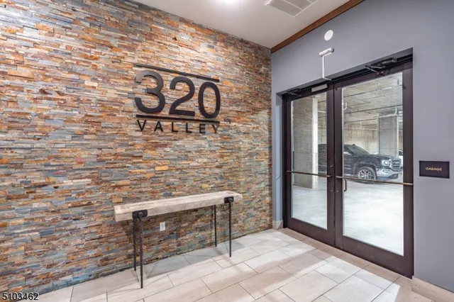 a view of a entryway with a bench