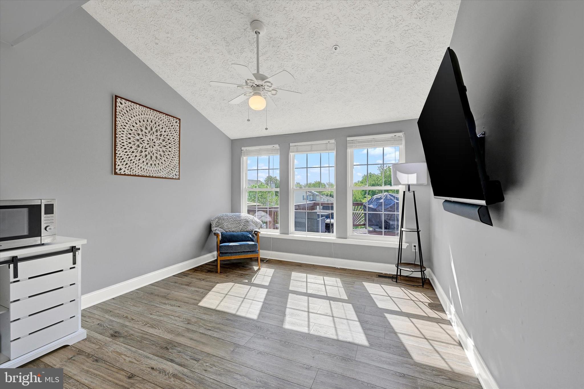 402 MacIntosh Circle Joppa, MD 21085 - Photo 14 of 29 a living room with furniture and a flat screen tv