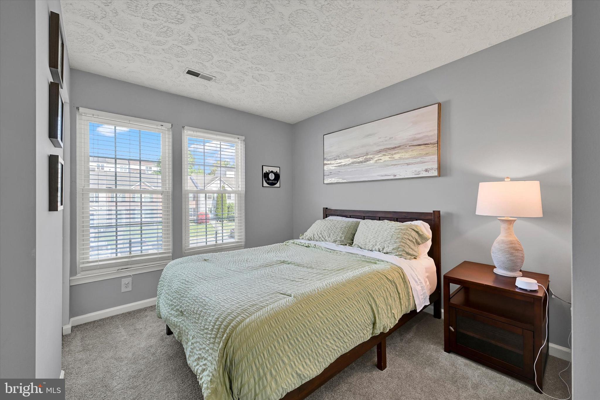 402 MacIntosh Circle Joppa, MD 21085 - Photo 18 of 29 a bedroom with a bed and a window