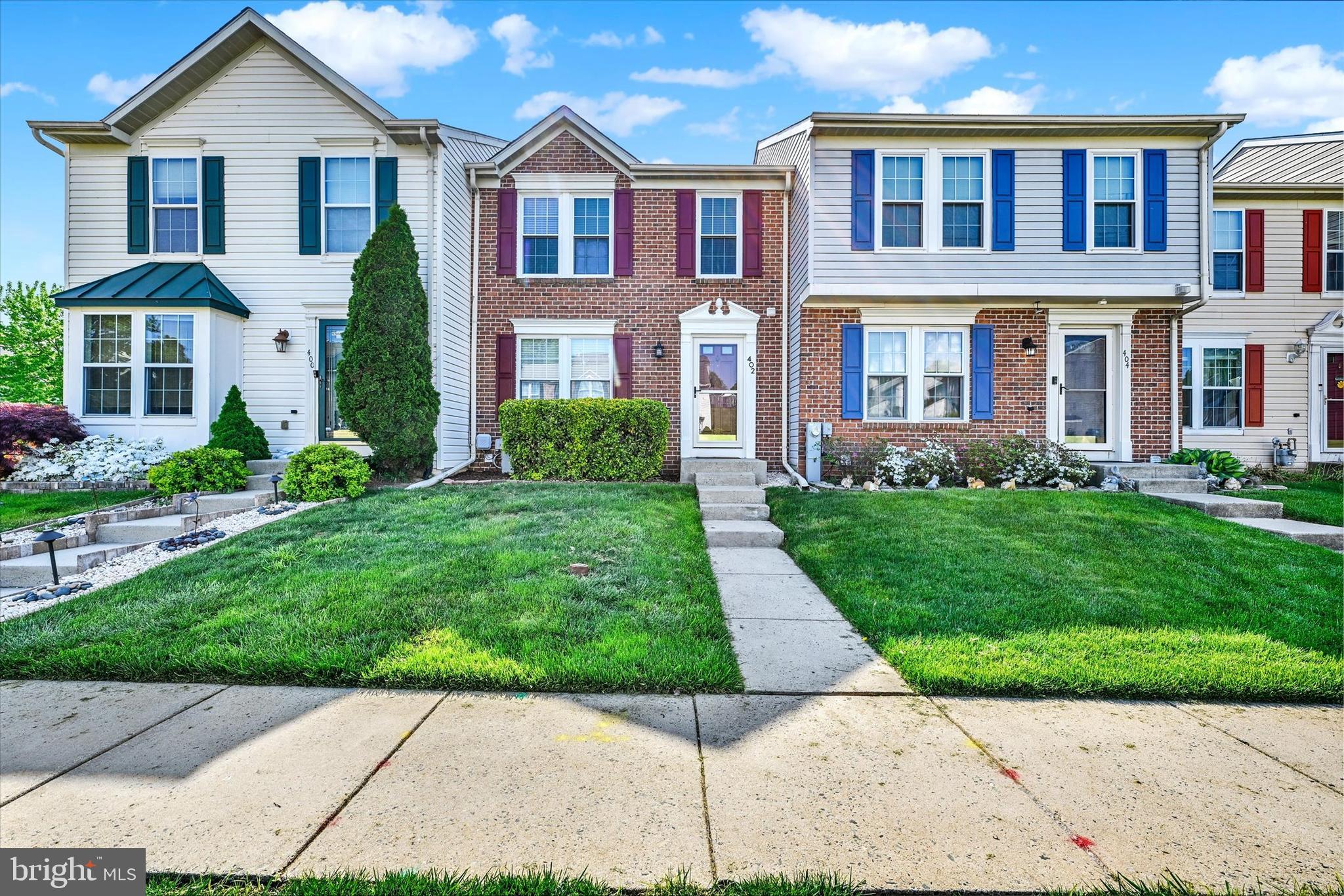 402 MacIntosh Circle Joppa, MD 21085 - Photo 2 of 29 a front view of a house with a yard