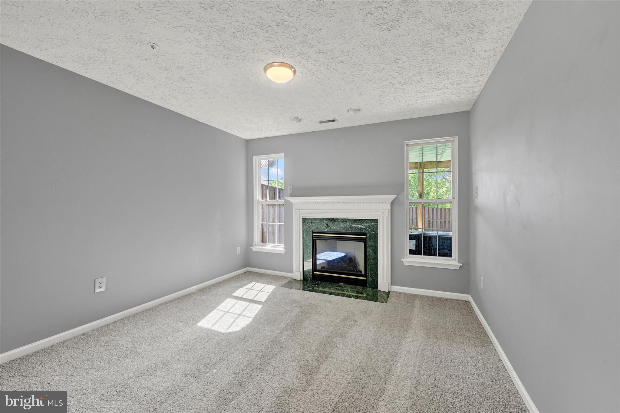 402 MacIntosh Circle Joppa, MD 21085 - Photo 24 of 29 a view of empty room with a fireplace