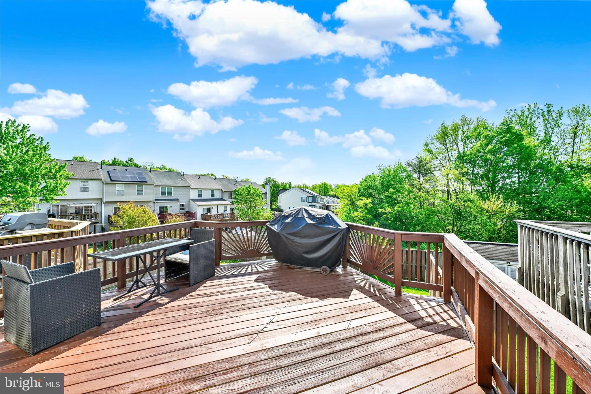 402 MacIntosh Circle Joppa, MD 21085 - Photo 26 of 29 a view of a balcony with wooden floor and outdoor seating