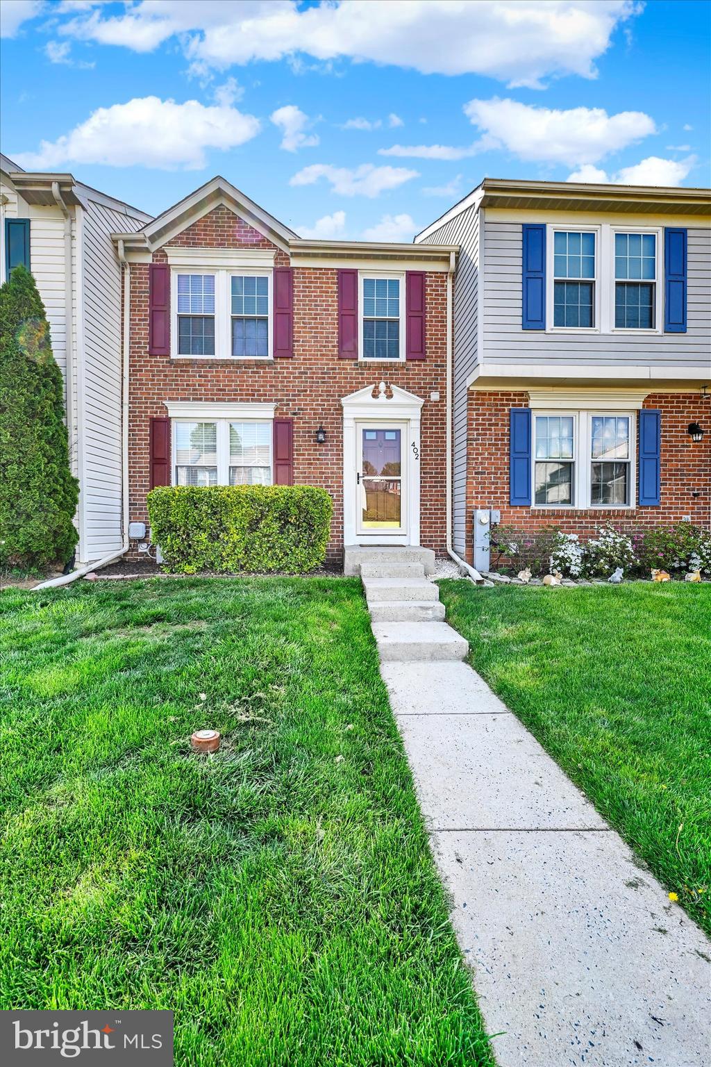 402 MacIntosh Circle Joppa, MD 21085 - Photo 3 of 29 a front view of a house with a yard