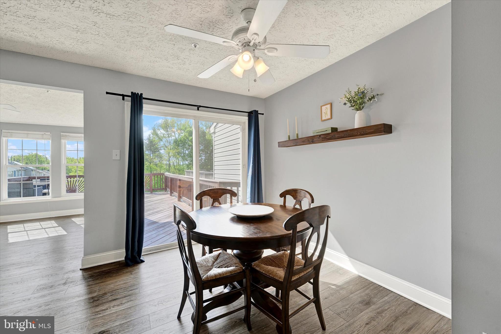 402 MacIntosh Circle Joppa, MD 21085 - Photo 8 of 29 a view of a dining room with furniture window and outside view