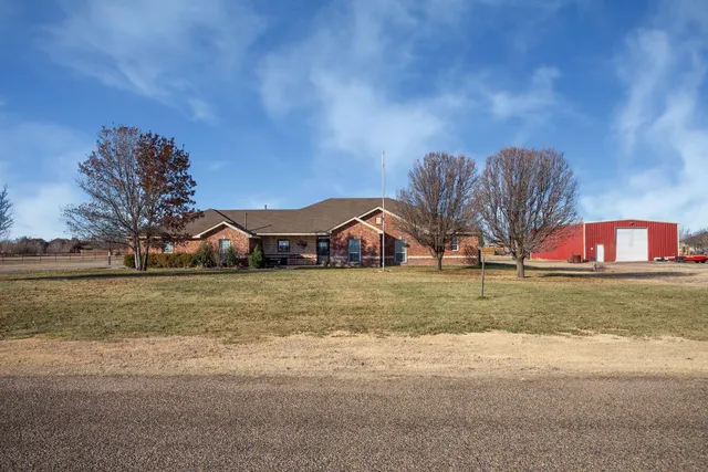 a front view of house with yard