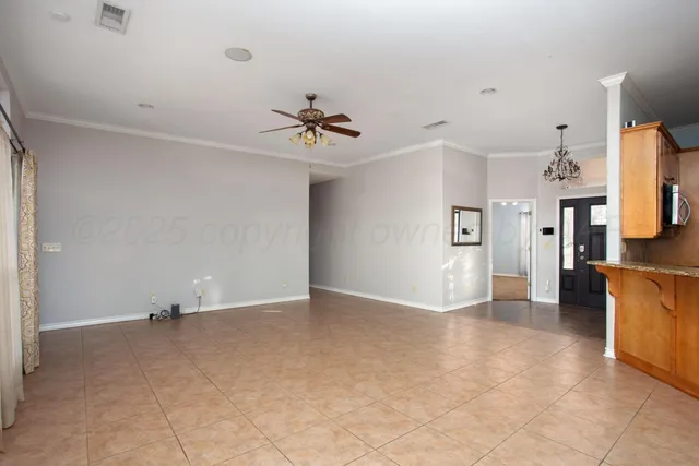 a kitchen with stainless steel appliances granite countertop a sink a stove and refrigerator