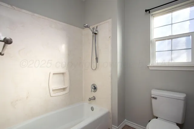 a bathroom with a sink vanity and a mirror