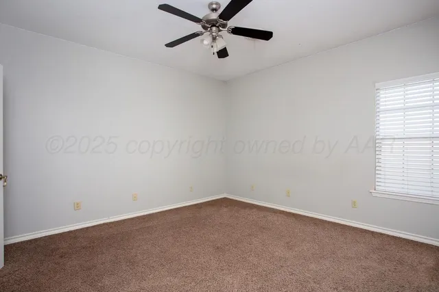 a kitchen with stainless steel appliances granite countertop a refrigerator and a stove