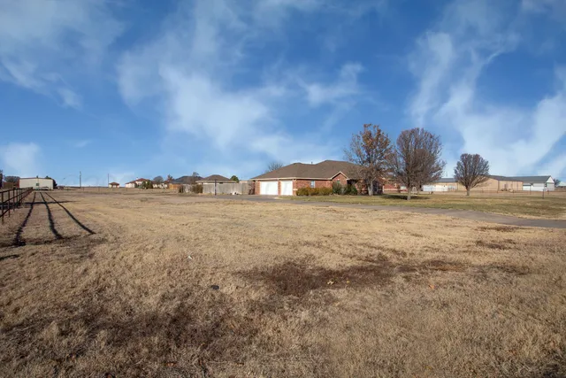 a view of a backyard with a area