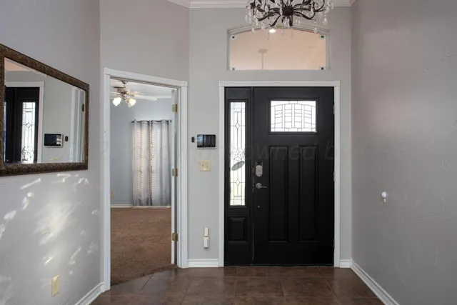 a view of a livingroom with a kitchen