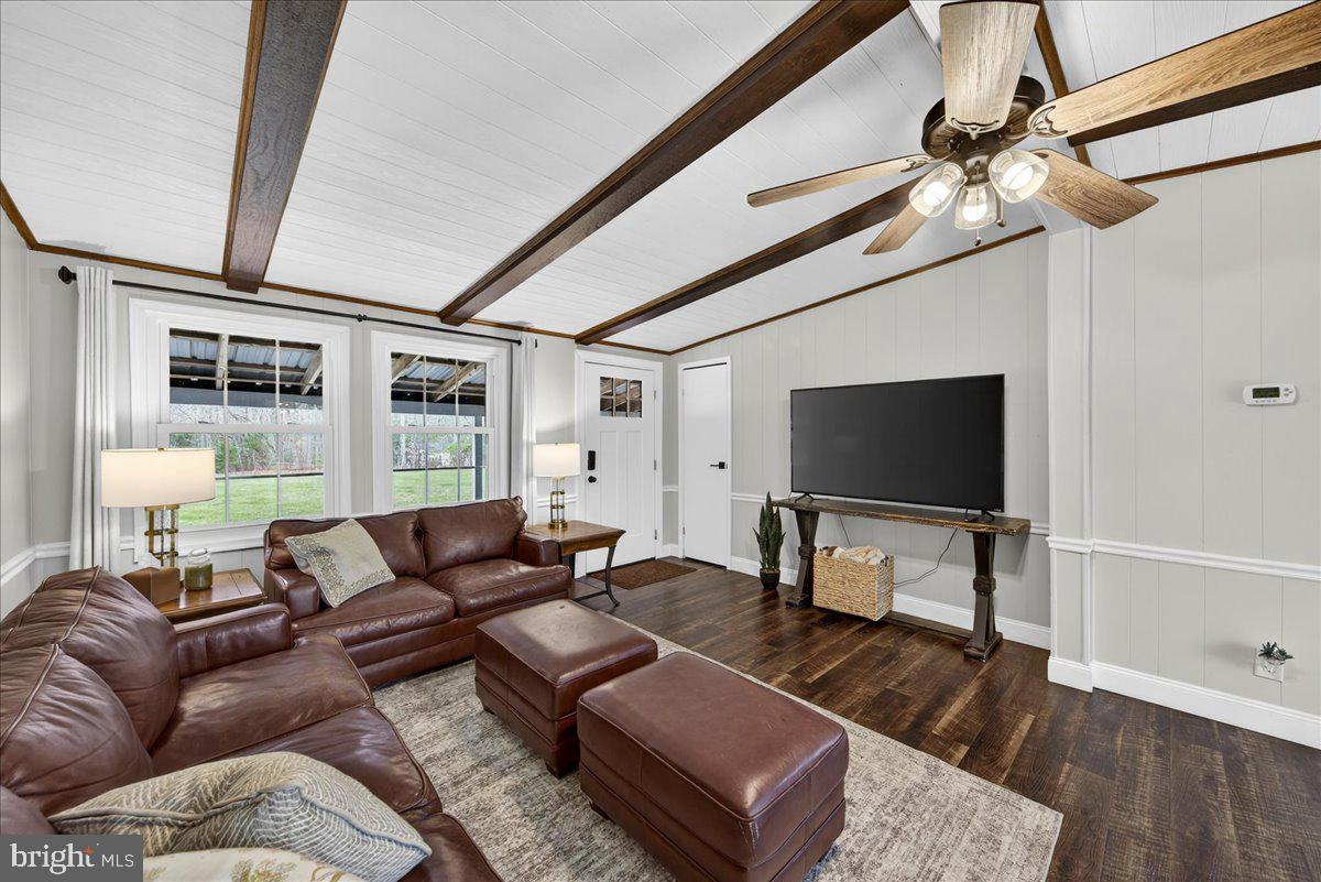 66 Ordinary Road Mineral, VA 23117 - Photo 11 of 96 a living room with furniture and a flat screen tv