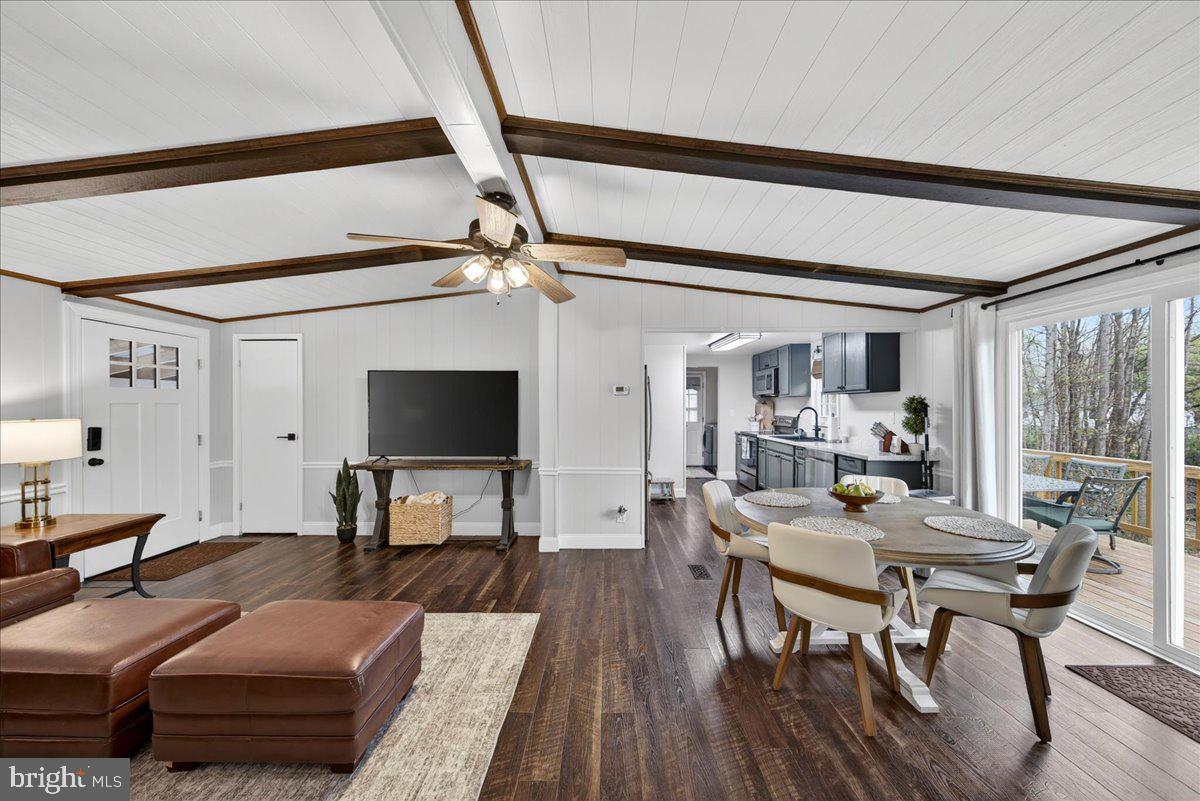 66 Ordinary Road Mineral, VA 23117 - Photo 12 of 96 a living room with furniture and a flat screen tv