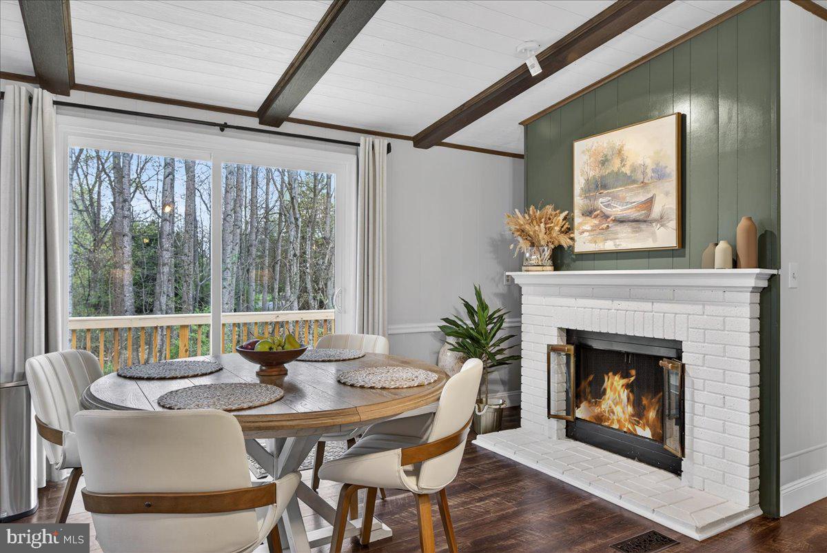 66 Ordinary Road Mineral, VA 23117 - Photo 16 of 96 a view of a dining room with furniture window and outside view