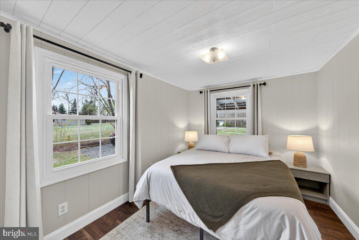 66 Ordinary Road Mineral, VA 23117 - Photo 27 of 96 a bedroom with a bed and a window
