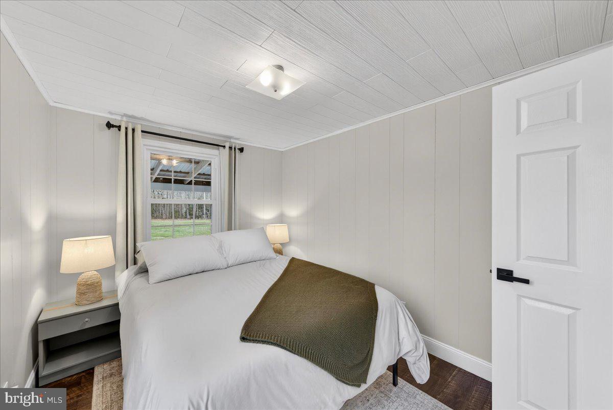 66 Ordinary Road Mineral, VA 23117 - Photo 29 of 96 a bedroom with a bed and a window