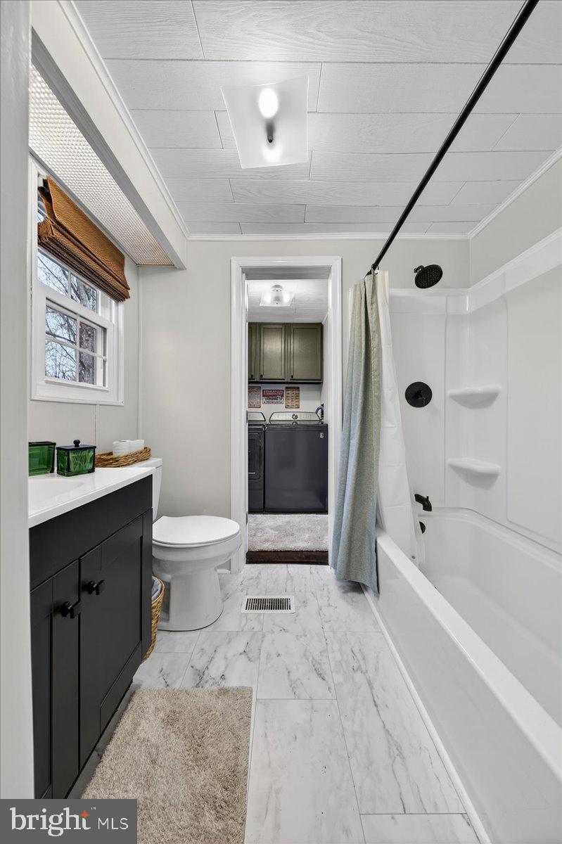 66 Ordinary Road Mineral, VA 23117 - Photo 41 of 96 a bathroom with a toilet a sink and bathtub