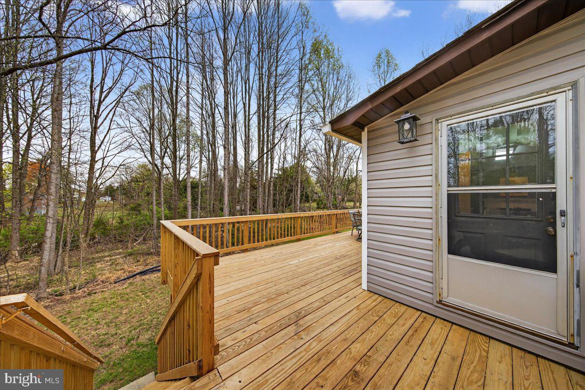 66 Ordinary Road Mineral, VA 23117 - Photo 48 of 96 a view of a balcony with wooden floor and iron fence
