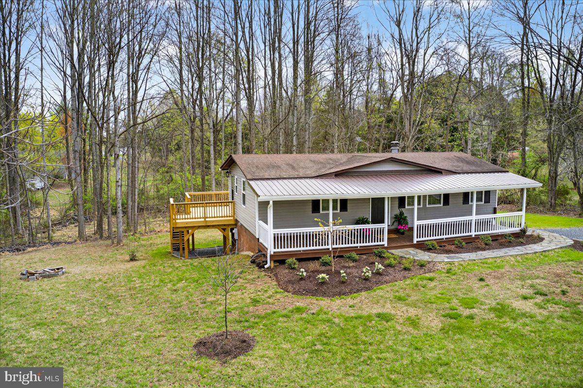 66 Ordinary Road Mineral, VA 23117 - Photo 73 of 96 a view of a house with a yard and sitting area