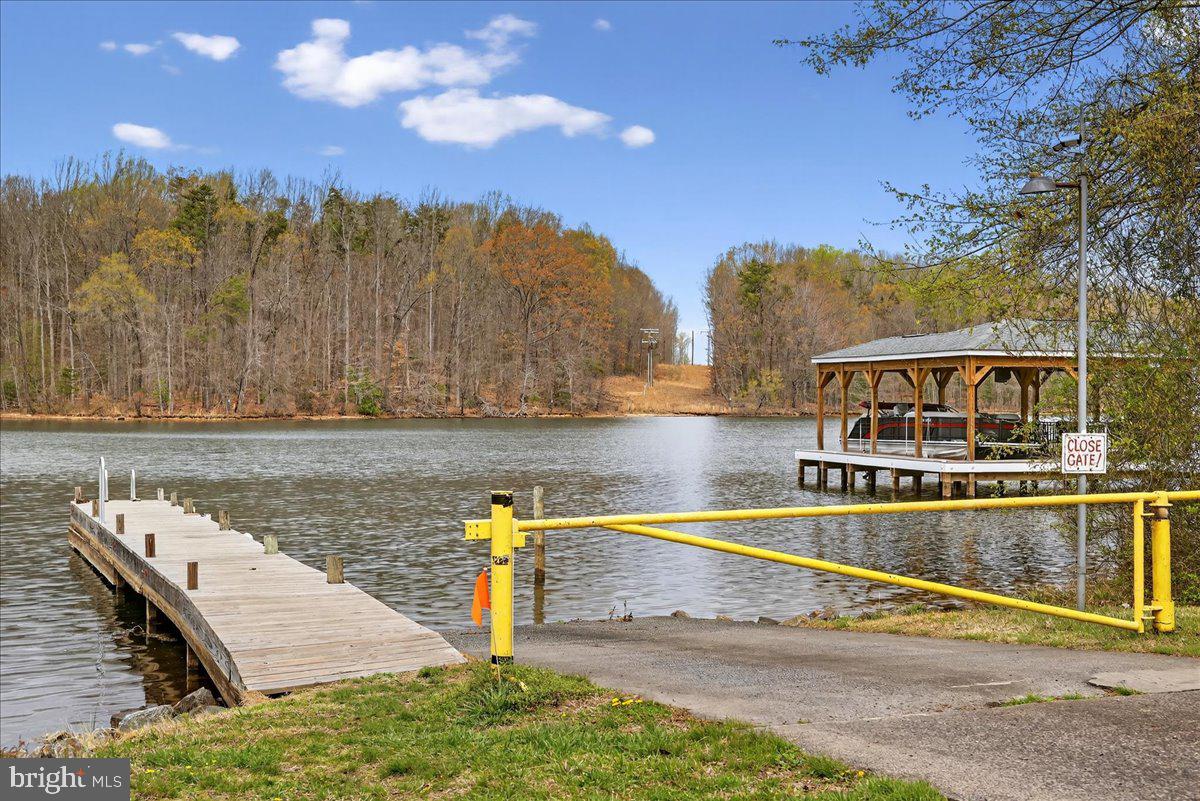 66 Ordinary Road Mineral, VA 23117 - Photo 87 of 96 a view of a lake with houses in the background
