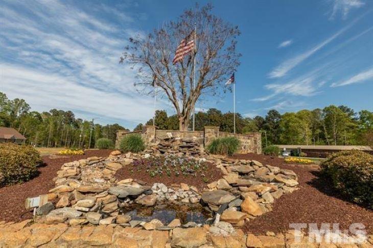147 Shaman Drive Spring Hope, NC 27882 - Photo 4 of 5 a view of a yard with wooden fence