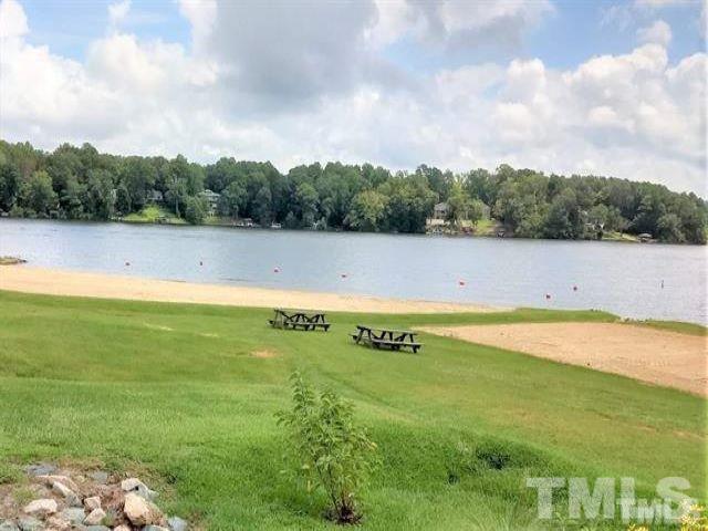 147 Shaman Drive Spring Hope, NC 27882 - Photo 5 of 5 a view of a swimming pool and lake