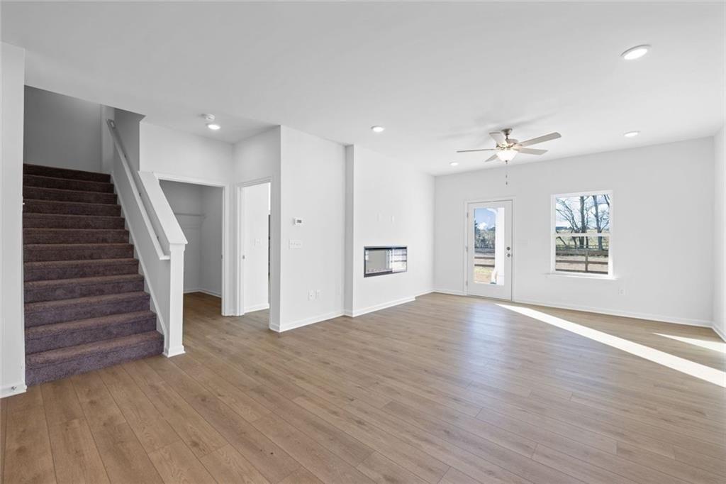 22 Willow Circle Rock Spring, GA 30739 - Photo 20 of 41 a view of an empty room with wooden floor and windows