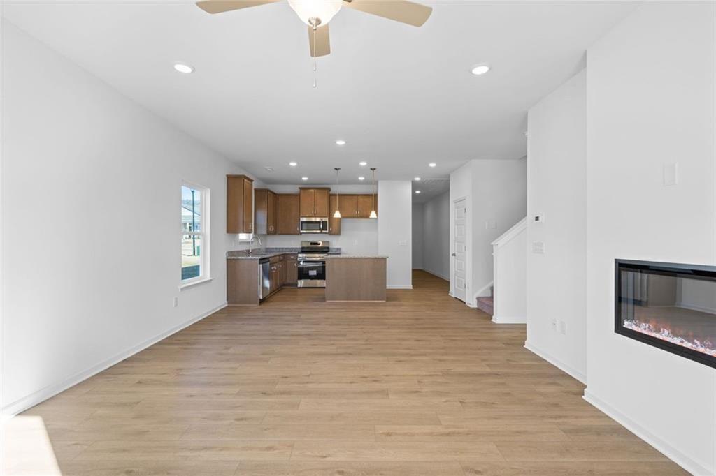 22 Willow Circle Rock Spring, GA 30739 - Photo 21 of 41 a view of kitchen with kitchen island wooden floor center island and appliances