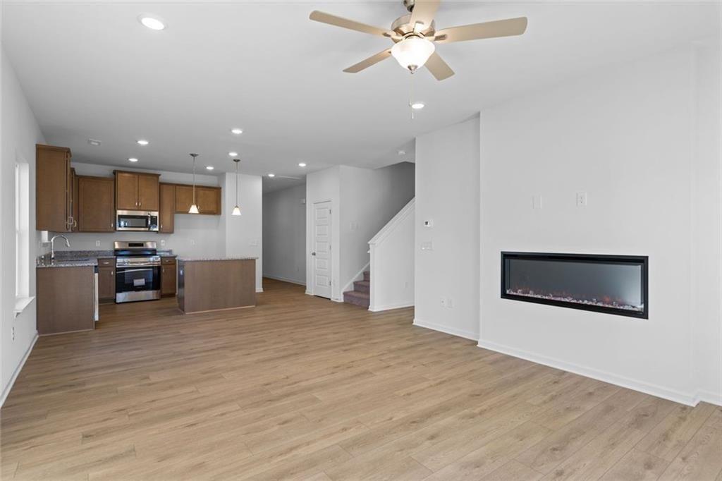 22 Willow Circle Rock Spring, GA 30739 - Photo 22 of 41 a view of a kitchen with a sink and a microwave