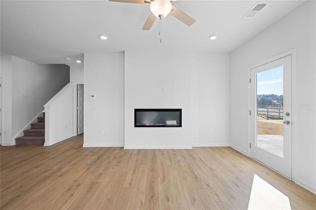 22 Willow Circle Rock Spring, GA 30739 - Photo 25 of 41 an empty room with wooden floor and windows