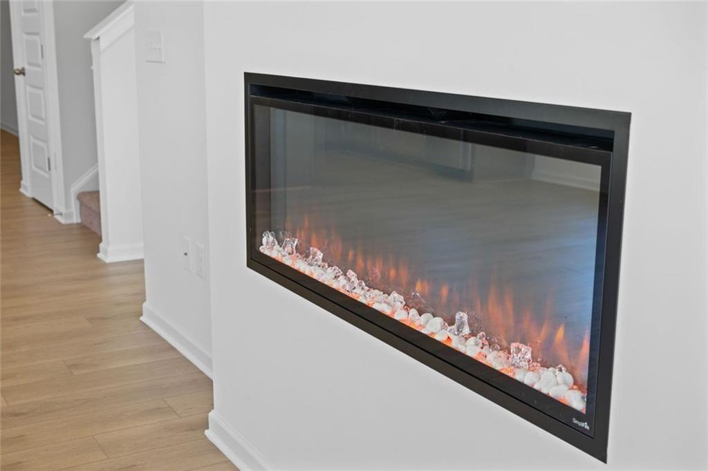 22 Willow Circle Rock Spring, GA 30739 - Photo 26 of 41 a view of a living room with wooden floor and stairs