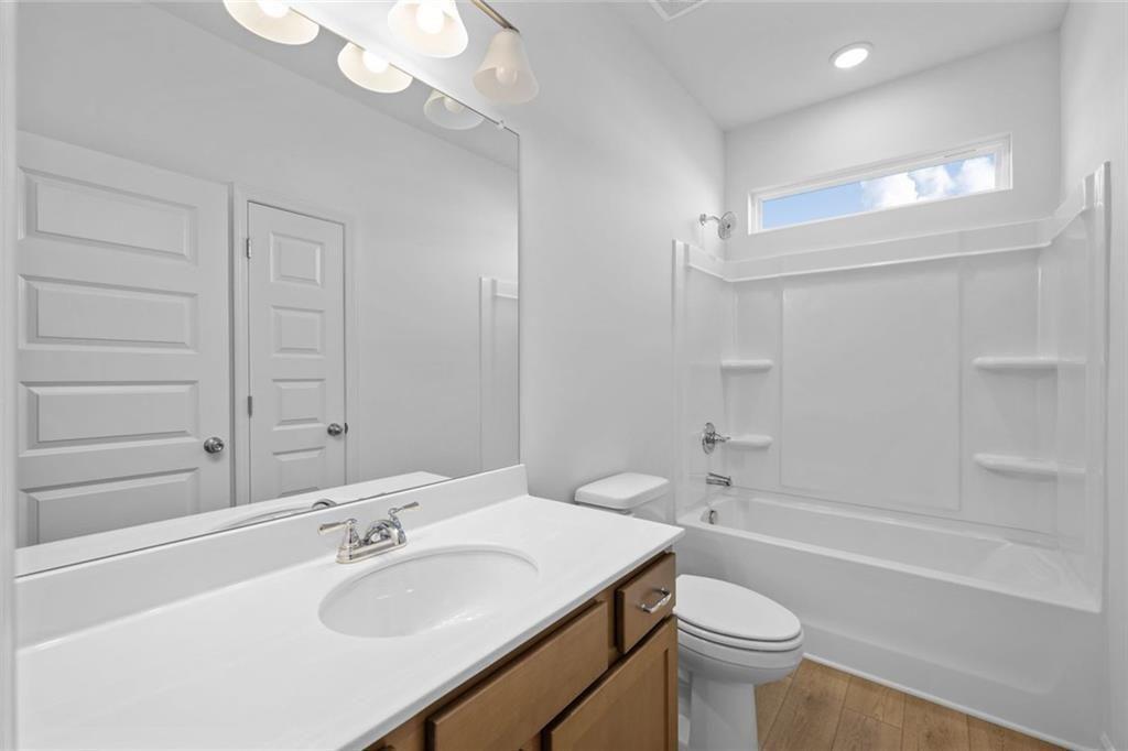 22 Willow Circle Rock Spring, GA 30739 - Photo 9 of 41 a bathroom with a sink a toilet and shower