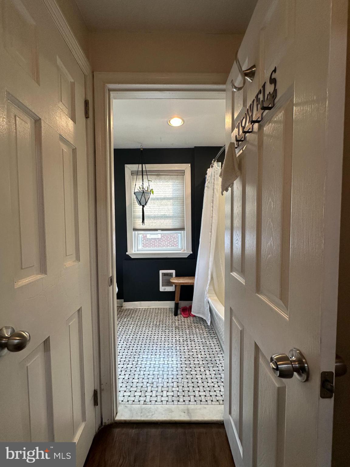 30 East Providence Road Lansdowne, PA 19050 - Photo 20 of 33 a view of a hallway with wooden floor and windows