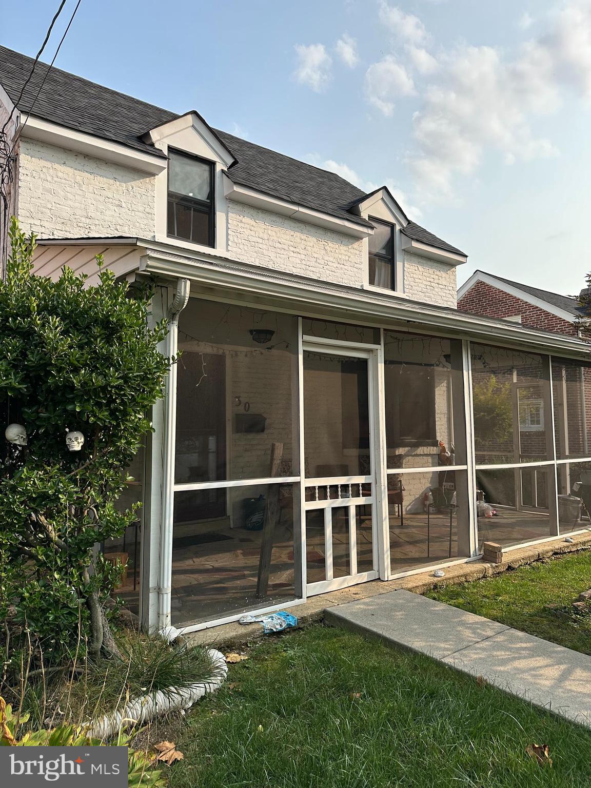 30 East Providence Road Lansdowne, PA 19050 - Photo 3 of 33 a front view of a house with a yard