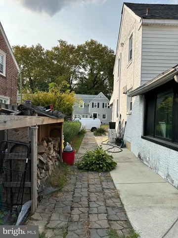 a view of a street with sitting area