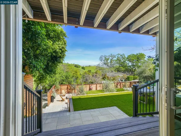 a view of a porch with a yard