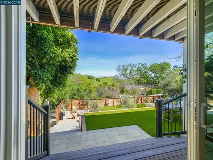 a view of a porch with a yard