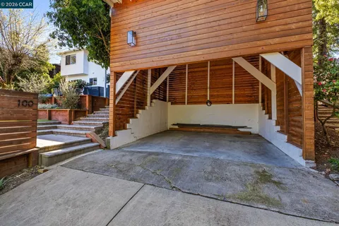 a view of a house with wooden stairs