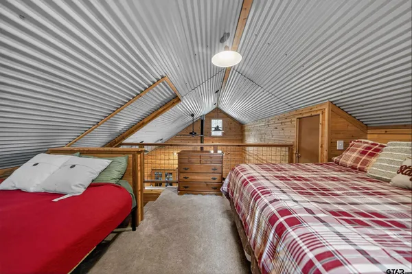 a bed room with a bed and a walk in closet