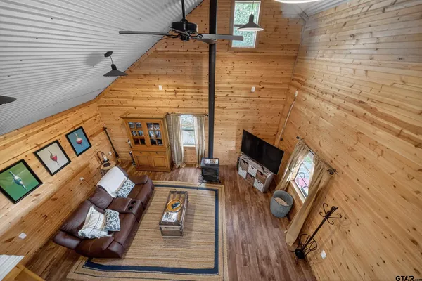 a view of a living room stove with wooden floor
