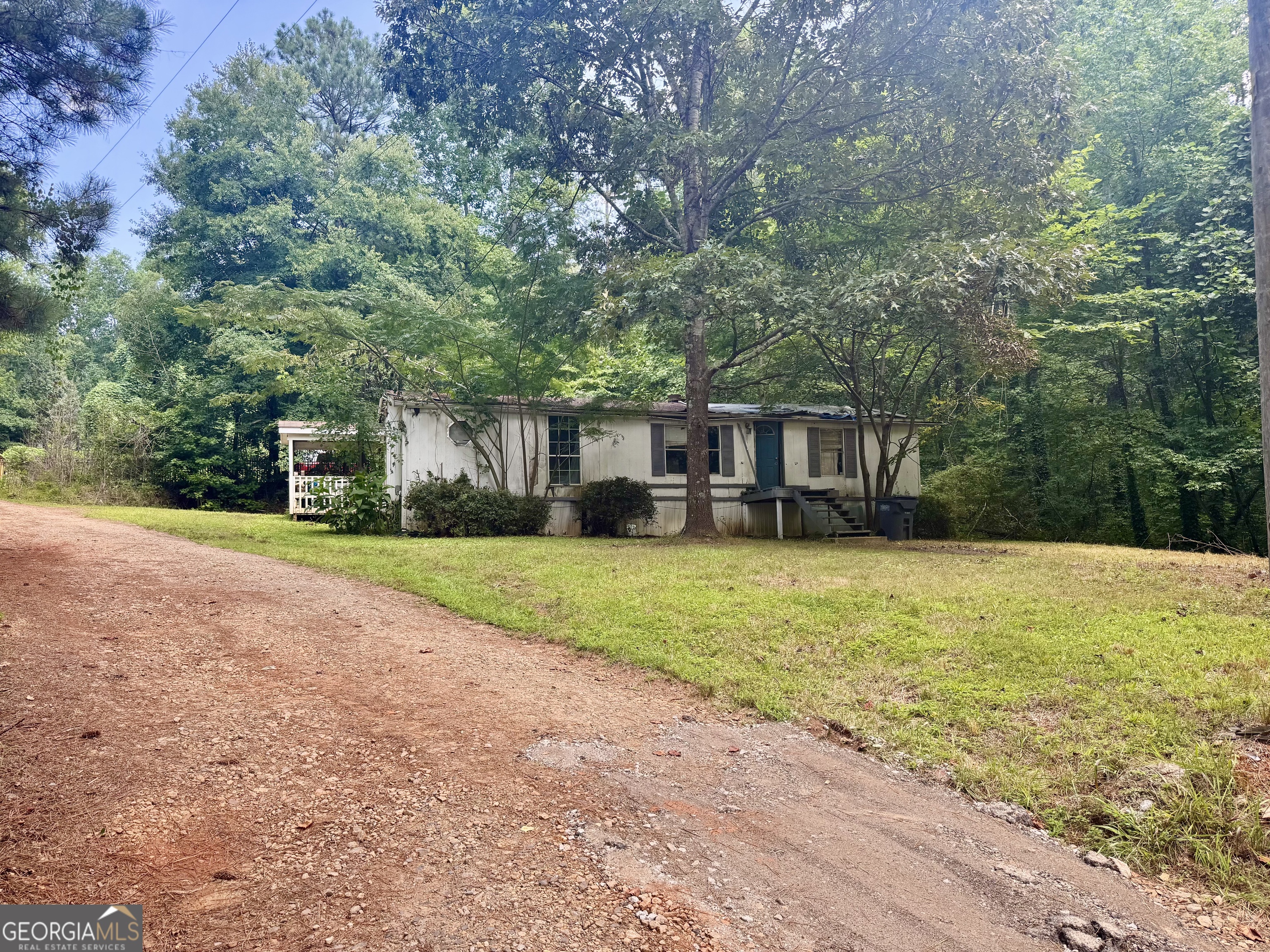 5324 Robin Trail Braselton, GA 30517 - Photo 2 of 10 a front view of house with yard and green space