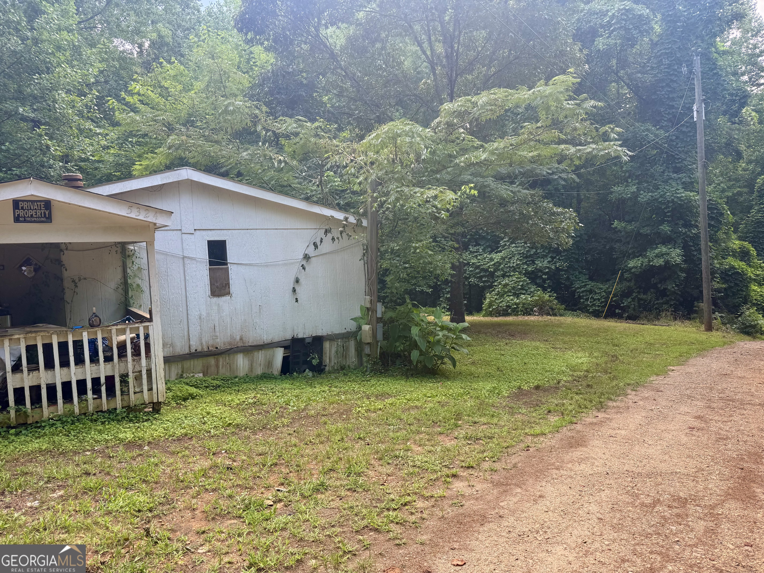 5324 Robin Trail Braselton, GA 30517 - Photo 6 of 10 a view of a house with backyard