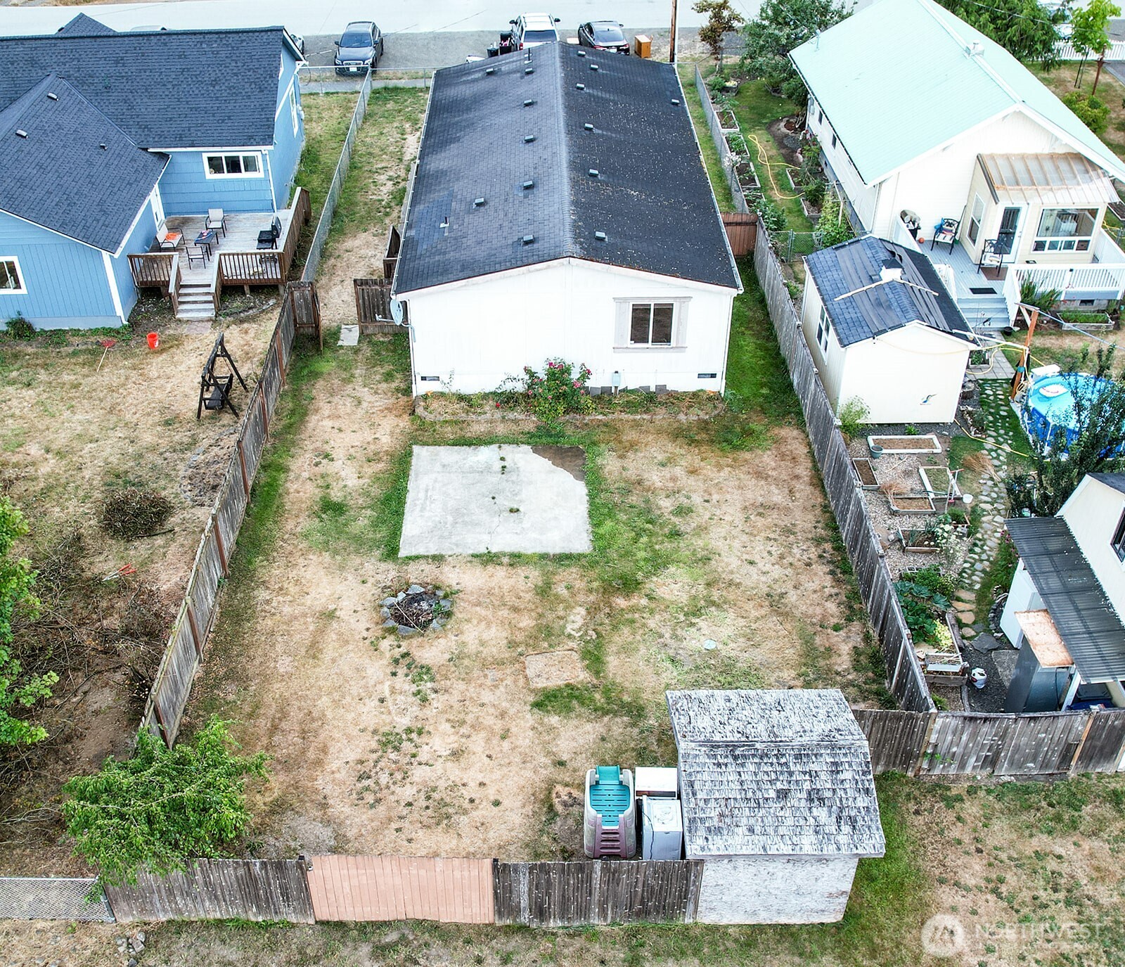 an aerial view of a house with outdoor space