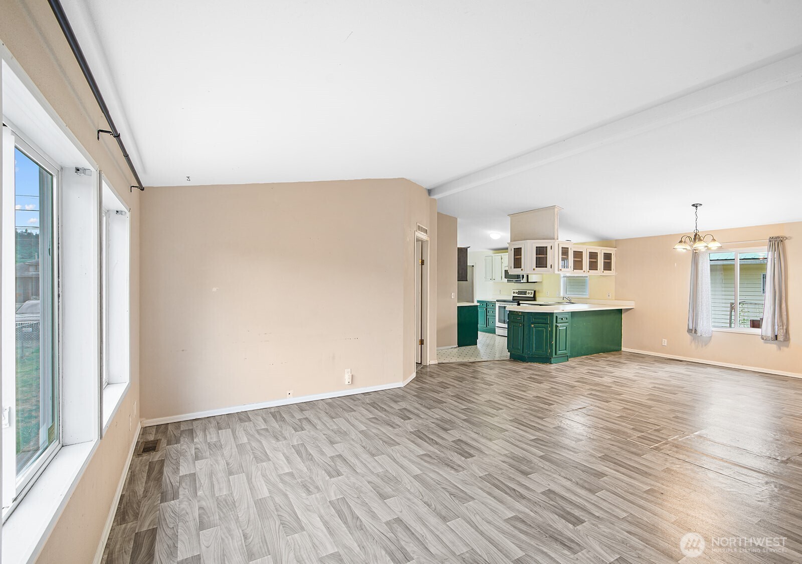 124 South 6th Street McCleary, WA 98557 - Photo 11 of 33 a view of a kitchen with wooden floor and a kitchen