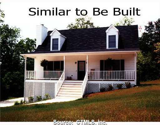 379 Wauregan Road Killingly, CT 06239 - Photo 1 of 1 a view of a brick house with wooden fence